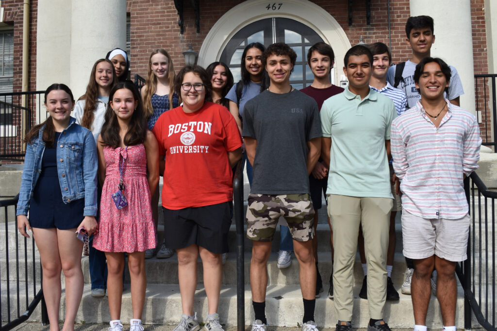 Photo of 14 TSF student directors in front of Civic Center